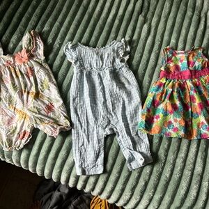 Set of Three Baby Outfits with Floral and Striped Patterns